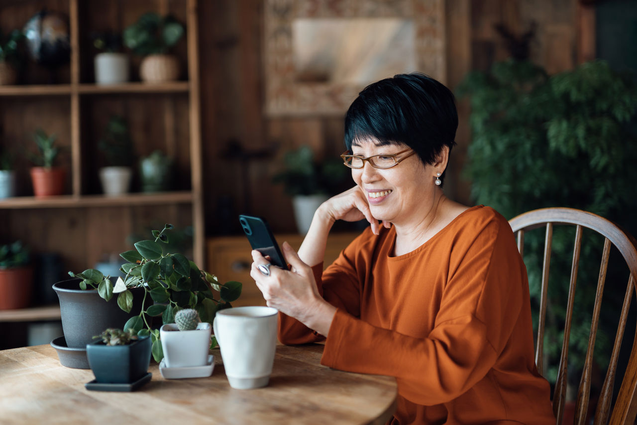 Elderly woman using a mobile phone
