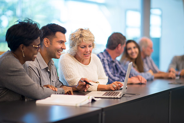 employees learning in a group setting