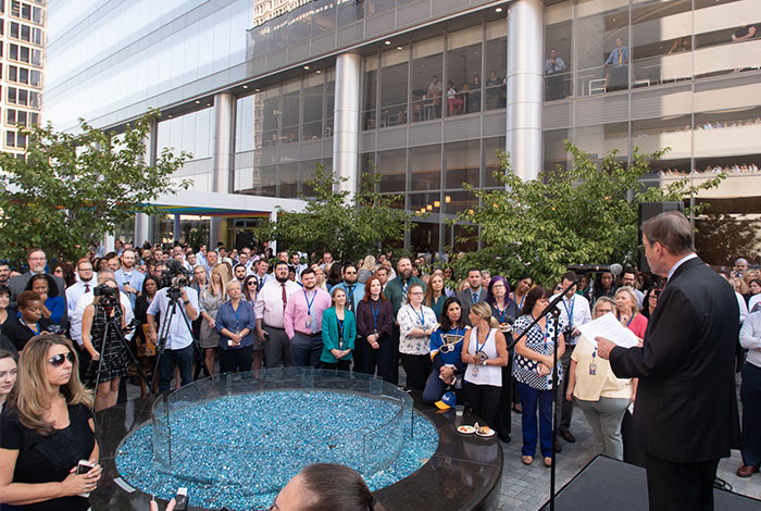 Michael Neidorff addresses crowd at United Way fundraising kickoff event in front of Centene Corporate Headquarters