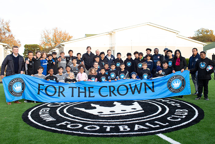Group photo of participants at the Pitches for Progress opening ceremony in Hunters Pointe