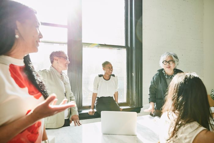 women in an office in a meeting