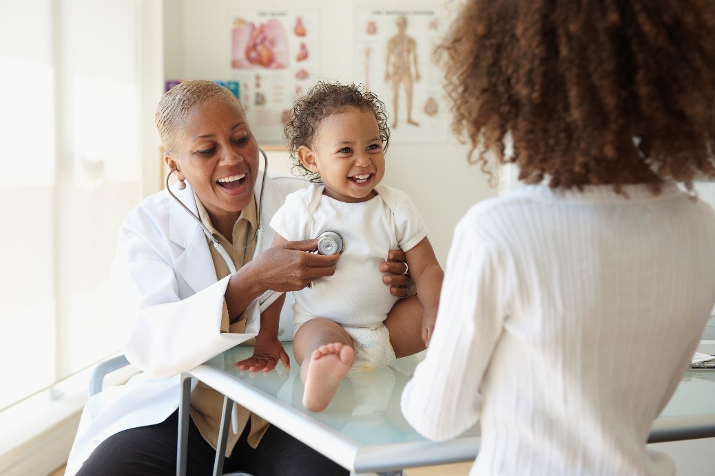 Smiling baby at doctor appointment