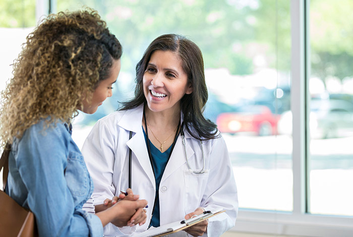 doctor reviewing medical information with patient