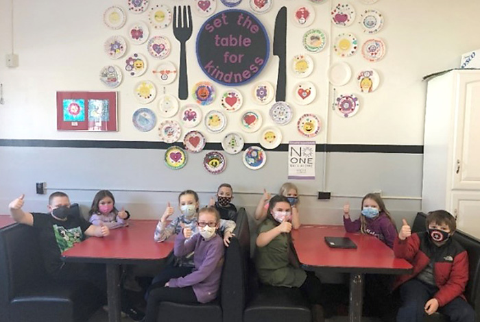 Big Cross Elementary students in a lunchroom.