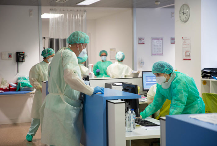 physicians and nurses consult in hospital