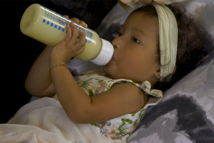 Baby drinking from bottle