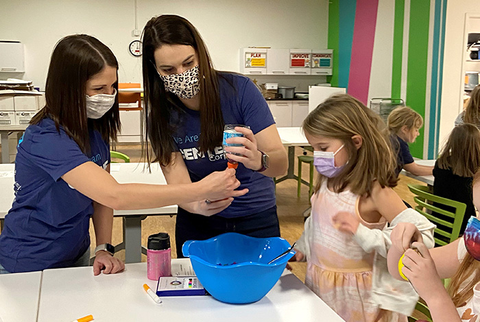 Centene volunteers at a girl scouts event.