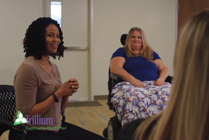 women sitting in circle talking