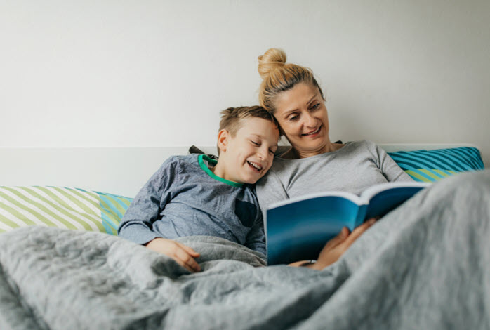 mother and child laugh together
