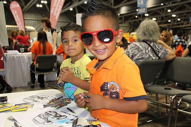 happy smiling child at National Council of La Raza conference