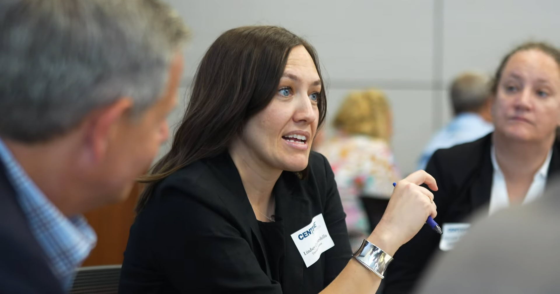 counselor with members during a discussion session