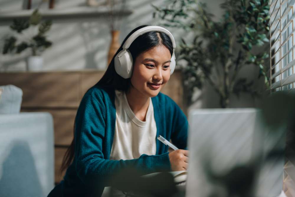 Virtual Learner in front of laptop