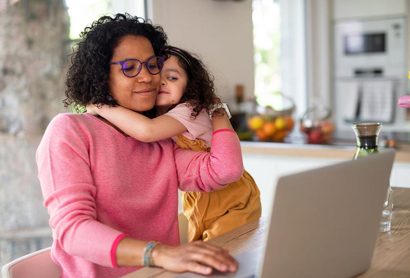 Woman holding her child